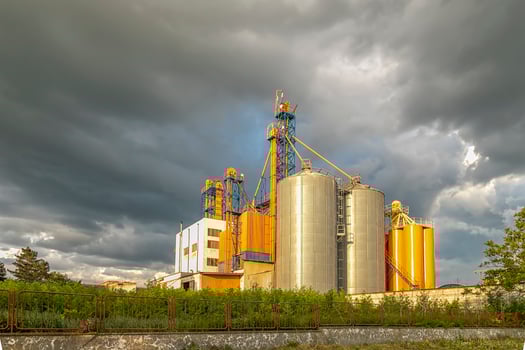 Modern Silo. Set of storage tanks cultivated agricultural crops processing plant. photo
