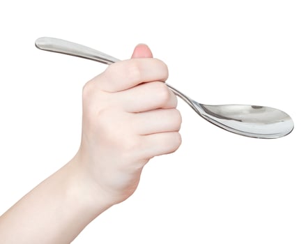hand with soup spoon isolated on white photo
