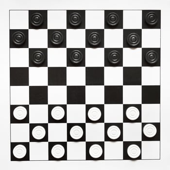 top view of starting position on draughts board photo