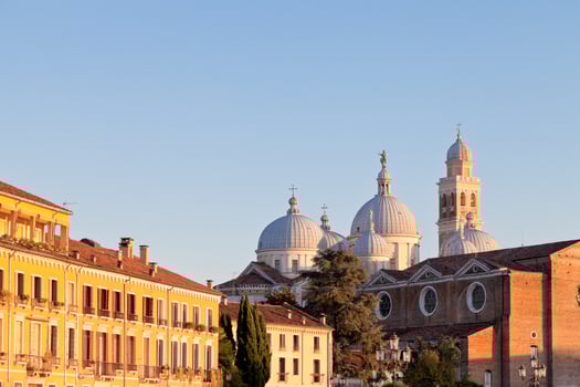 houses on Prato della Valle with a view Basilica of Santa Giustina of Padua photo