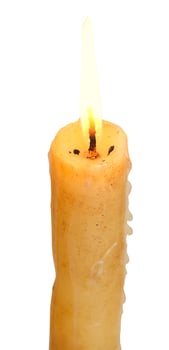 burning stearin candle close up isolated on white photo