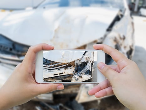 taking photo of the car crash accident damage