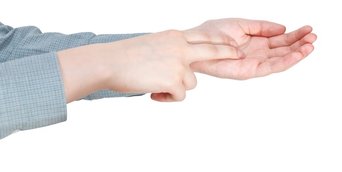 two fingers on palm - hand gesture photo