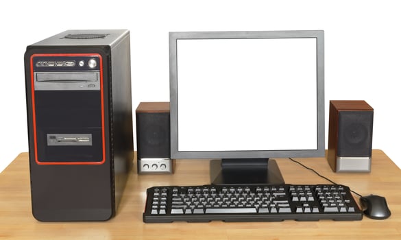 black desktop computer on wooden table photo
