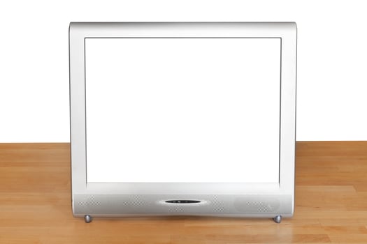 front view of grey TV set display on table photo