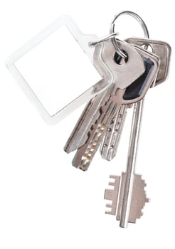 bunch of apartment keys on ring and keychain photo