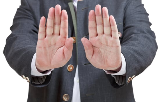 stop sign by two palms - businessman hand gesture photo