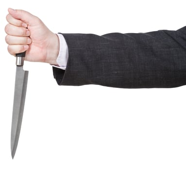 side view of knife in male hand photo