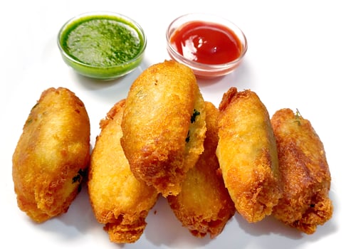 Healthy diet food concept. Tasty vegetable cutlet from potato, sabudana, sago and bread with sauce photo