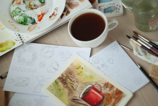 Art painting process on table photo