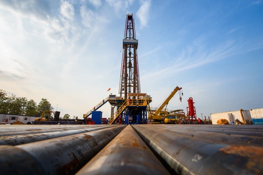 Oil and Gas Drilling Rig. Oil drilling rig operation on the oil platform in oil and gas industry. Top drive system of drilling rig. photo