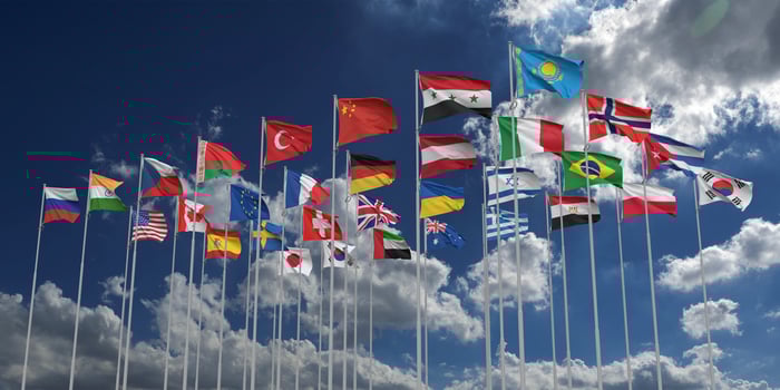 Worldwide global earth planet flag country community international business blue sky outdoor  government politic travel together agreement exhibition meeting group culture corporation unity teamwork photo