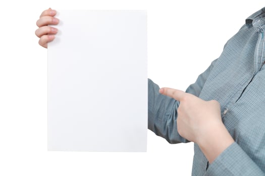 forefinger points on blank paper in female hand photo