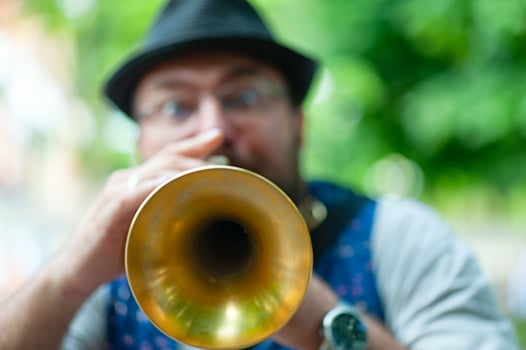 Trumpet hole of a Balkan music street musician photo