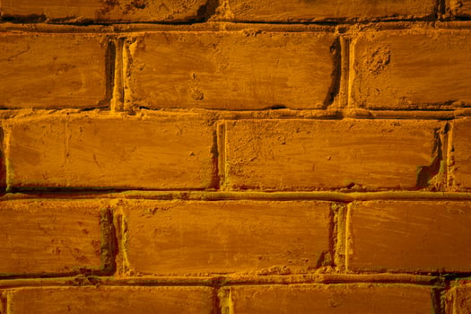 Abstract weathered texture stained old stucco light gray and aged paint white brick wall background in rural room, grungy rusty blocks of stonework technology color horizontal architecture wallpaper photo