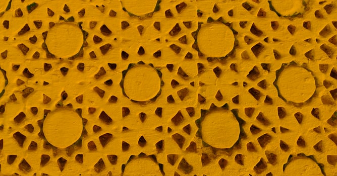 Yellow painted texture of handcrafted details. photo