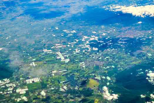 Top view aerial photo of settlements and fields