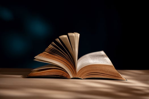 Reading and Education Learning Concept. Opened Book or Bible on Desk photo