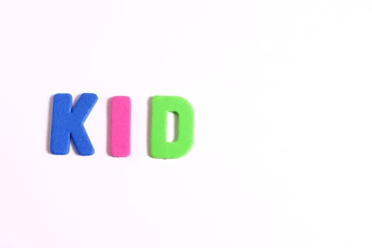Kids lettering word, on white photo