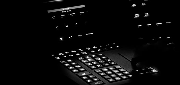 Edit video production control panel in studio. Editor editing and grade film in movie post room. photo