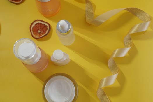 Immunity protection concept, antiviral prevention Serum and cosmetics with vitamin C. Essential oil from citrus fruits. Hyaluronic acid, botulin, serum in vials. Concept of cosmetic surgery for facial photo