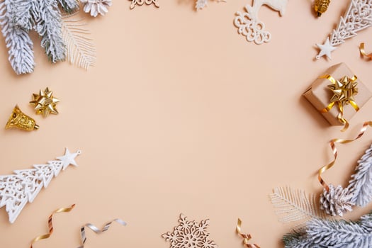 Christmas flat lay composition with gifts, cones, pine on colored background top view. Copy space photo