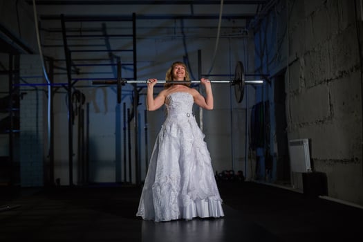 the bride in the gym. cross fit, healthy lifestyle photo