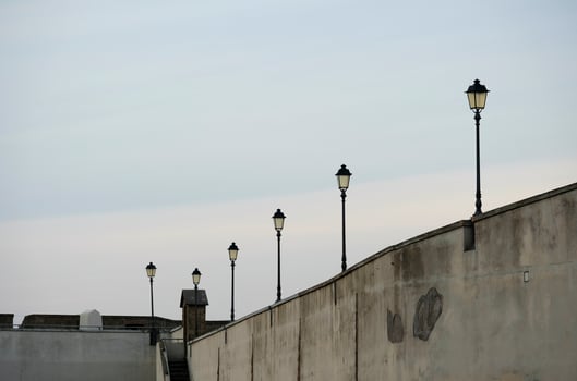 Row of lamp posts on Castle Sant Elmo in Naples, Italy photo