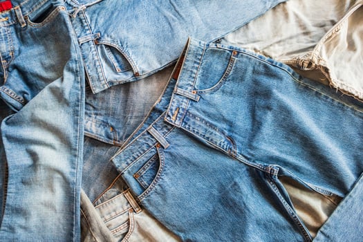 many denim blue jeans background photo