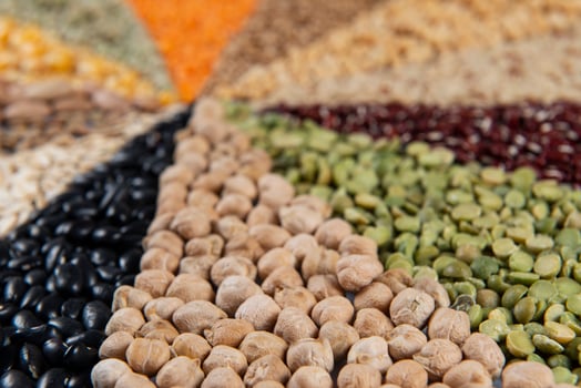 Big collection of different cereals and edible seeds. photo