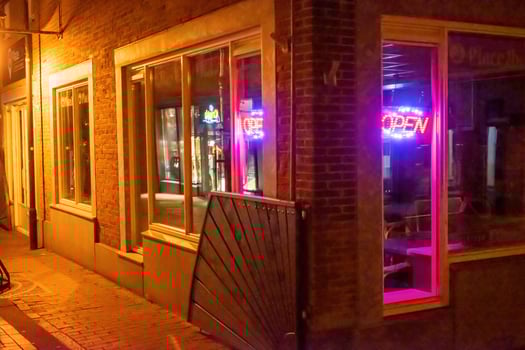entrance to the house in the night with lamps photo