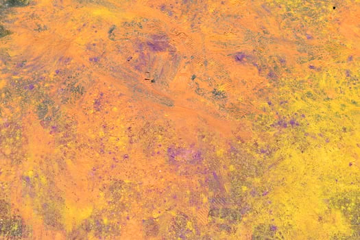 background of colored powder on the floor photo