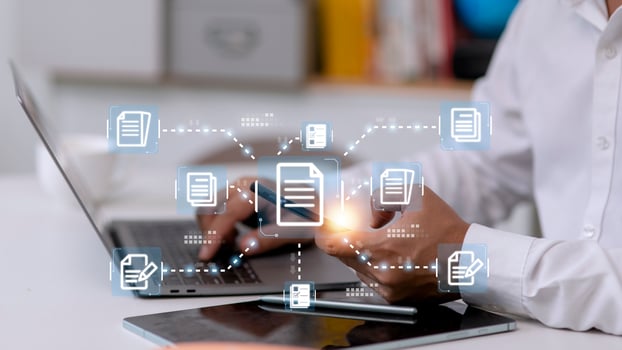 Businessman working with electronics document icons, E-document management, online documentation database, paperless office concept photo