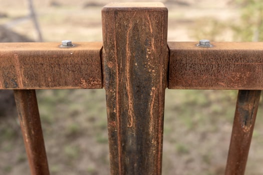 part of rusty iron fence photo