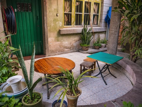 Relax Small Wooden table and chair in Chinese Old style house Garden at Shantou city China.Shantou city of Teochew people in Guangdong province China photo