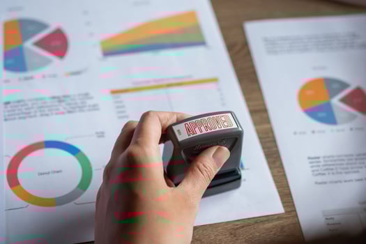 Marketing, Financial, Accounting, Planning, Businesswoman stamping approval on documents at office. photo