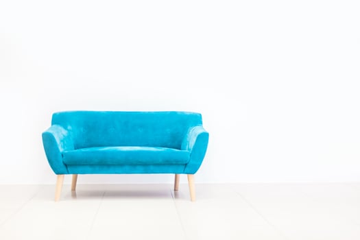 Minimal concept of living interior with blue sofa photo