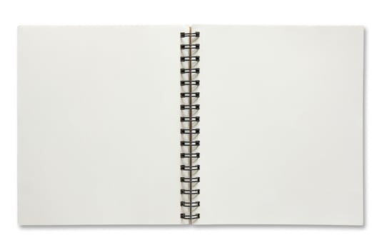 open spiral notebook isolated on white background photo