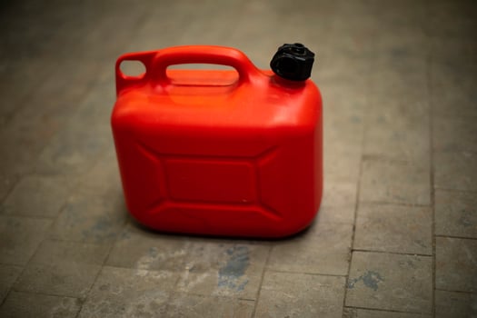 Red canister of fuel. Oil tank. photo