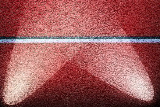 Close up view on concrete wall textures with three spotlights photo