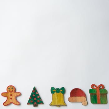 Christmas pattern with gingerbread man, tree, bell, santa hat and a gift photo