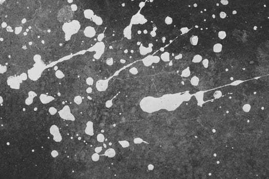 close up of paint splashes on the floor photo