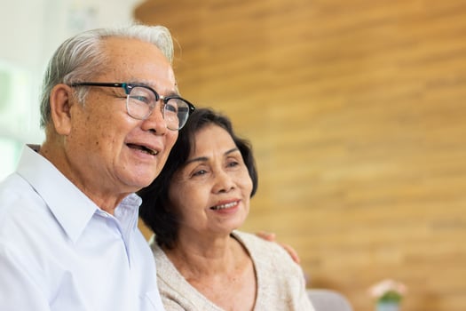 Nursing Home Care concept. elderly couple asian woman are sitting together happily. photo