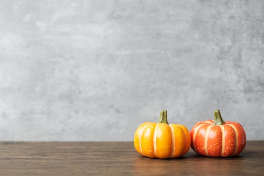 Orange pumpkin on table with copy space for banner background. Happy Halloween day, Hello October, fall autumn season, Festive, party and holiday concept photo
