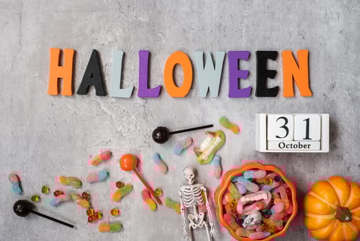 Happy Halloween day with ghost candies, pumpkin,  bowl and decorative. Trick or Threat, Hello October, fall autumn, Festive, party and holiday concept photo