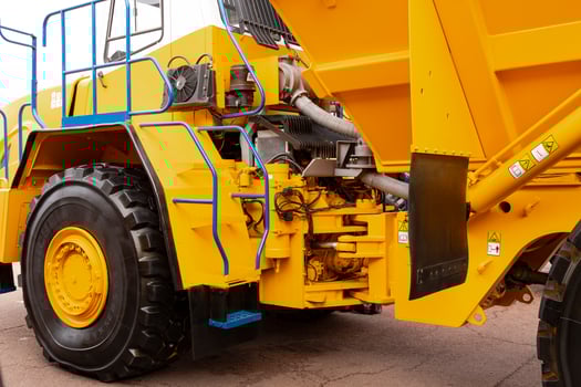 Minsk, Belarus, September 20, 2022- Yellow mining dump truck Belaz with a carrying capacity of twenty tons. photo