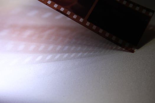 Shading light from photographic film intensity on a silver background photo