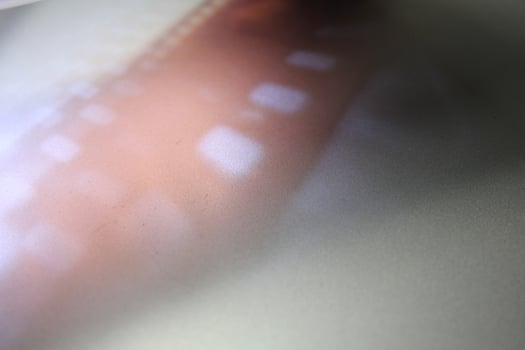 Shading light from photographic film intensity on a silver background photo