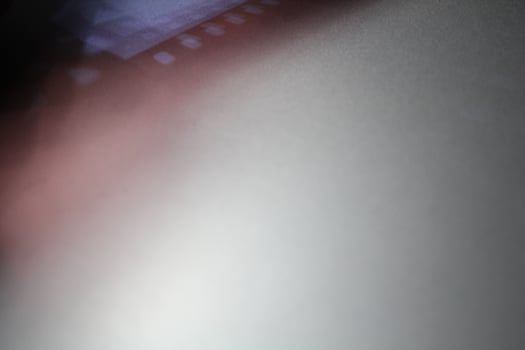 Shading light from photographic film intensity on a silver background photo