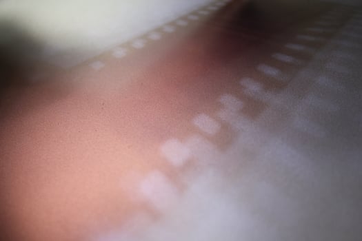 Shading light from photographic film intensity on a silver background photo